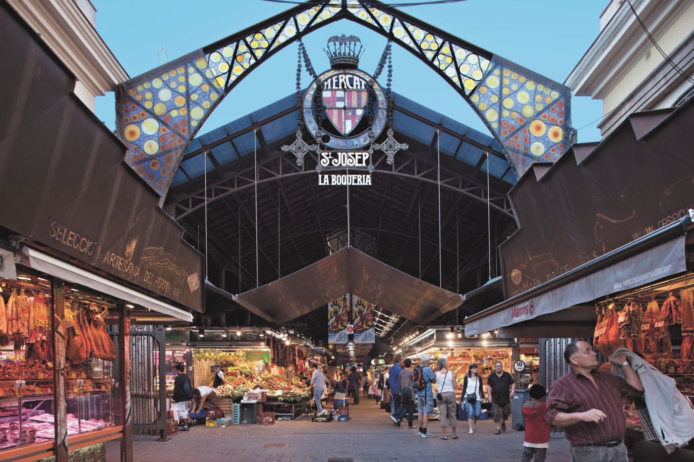 The Mercat de la Boqueria entrance with its Sant Josep sign and food stalls